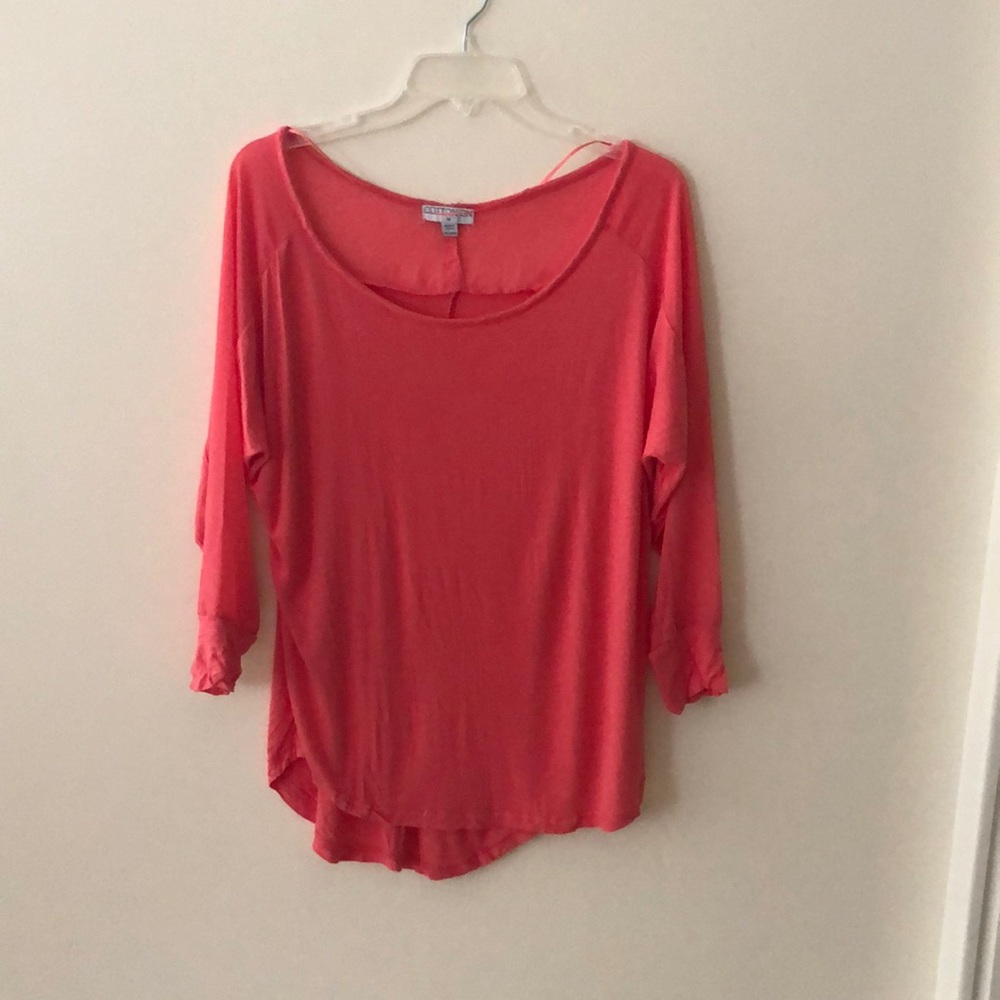 Women’s shirt size medium.